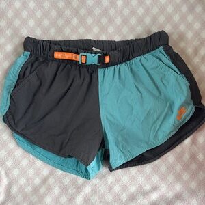 Nike Women's Black and Teal Athletic Shorts